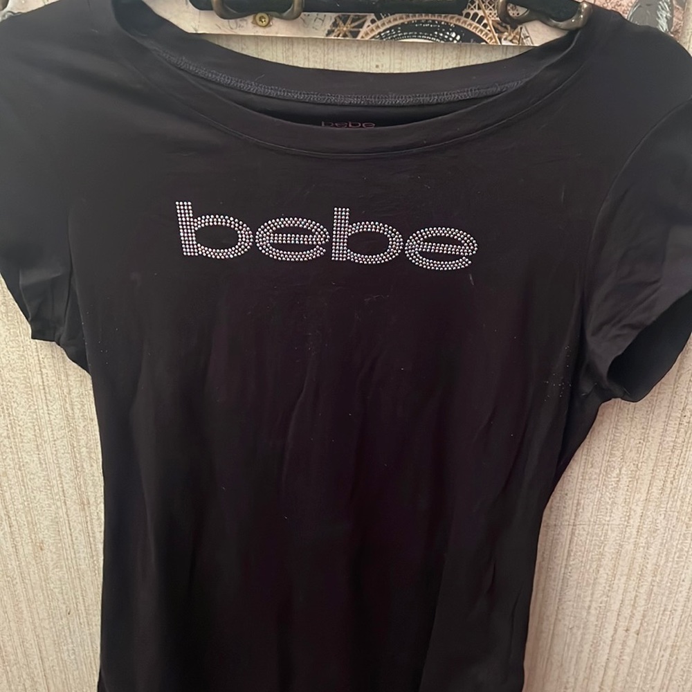 BEBE top size large black,letter on the chest good used condition.